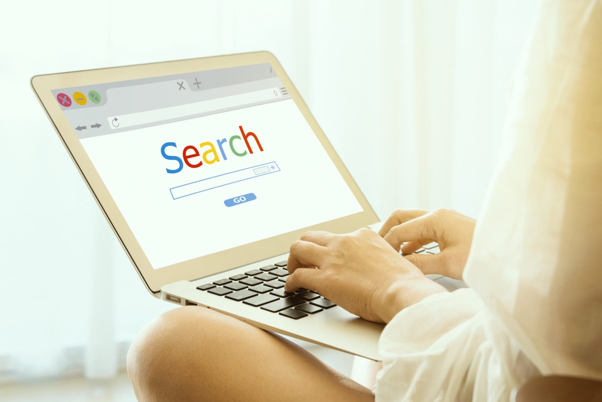 Women use laptop to find information in the room Women use laptop to find information in the room